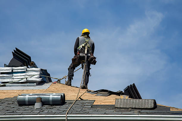 Professional Roofing technician working in Flanders, NY